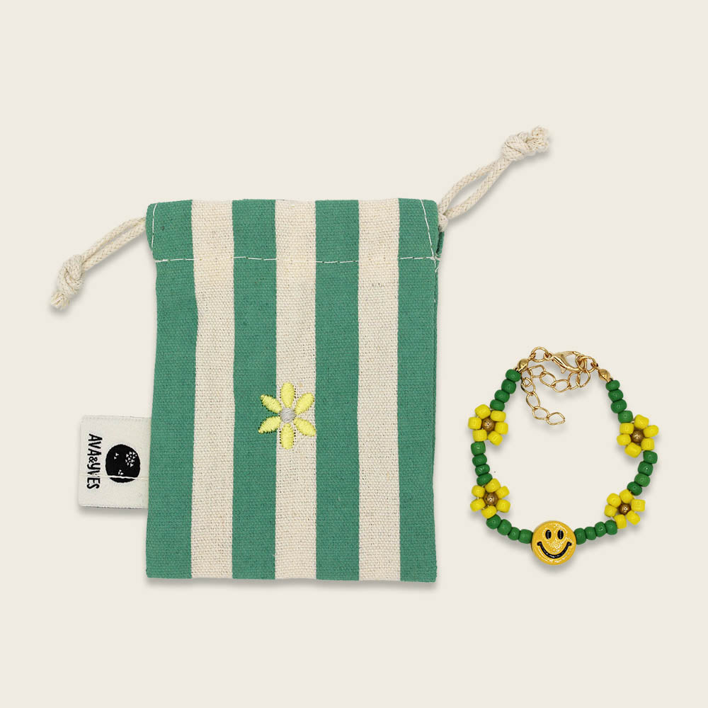Perlenarmband Smile mit vier Blumen