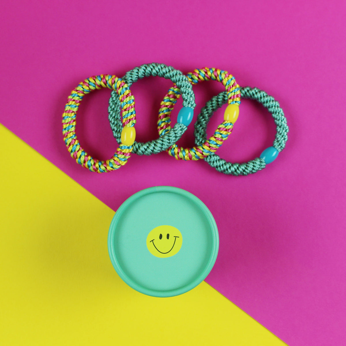 Haargummi-Set mint/gelb mit 4 Haargummis in runder Geschenkbo